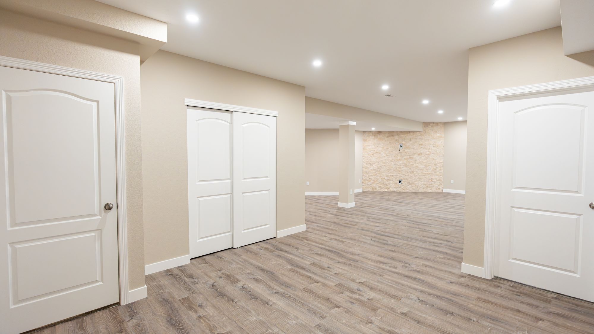 A finished basement by Basements.com